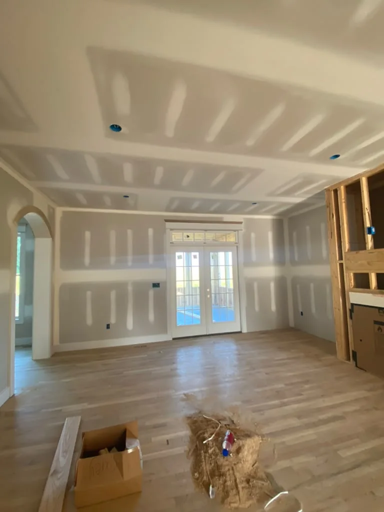 Room with drywall seams prepared for finishing